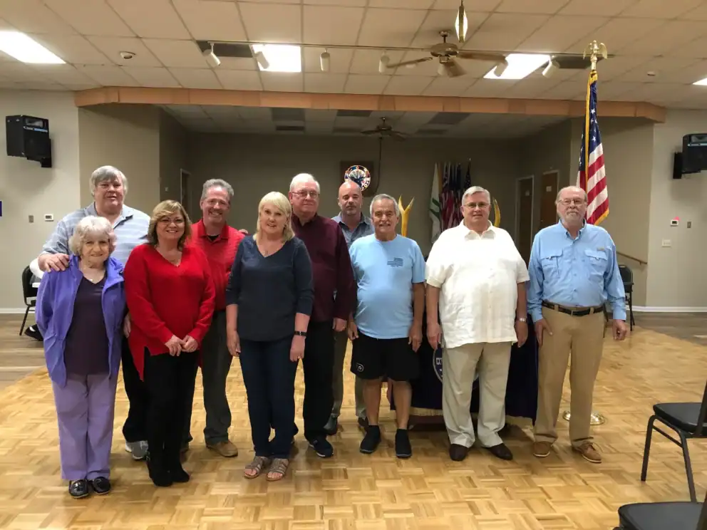 Elks Lodge 2582 members standing together in the lodge hall in Spring Hill FL