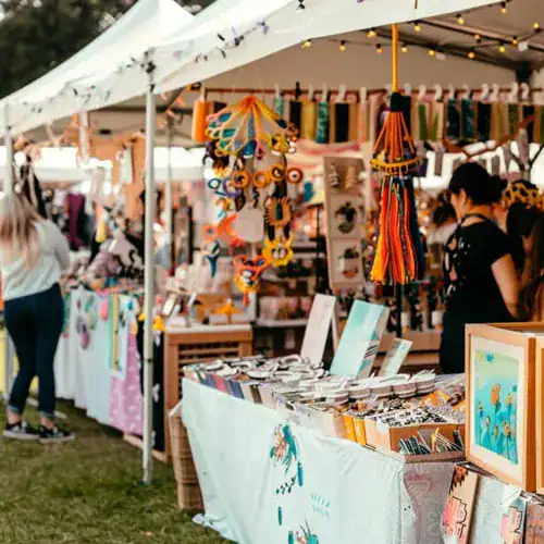 Colorful handcrafted jewelry and art displayed at Elks Lodge 2582 craft fair.